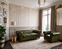 Fauteuil chesterfield cuir vert olive accoudoirs cloutés