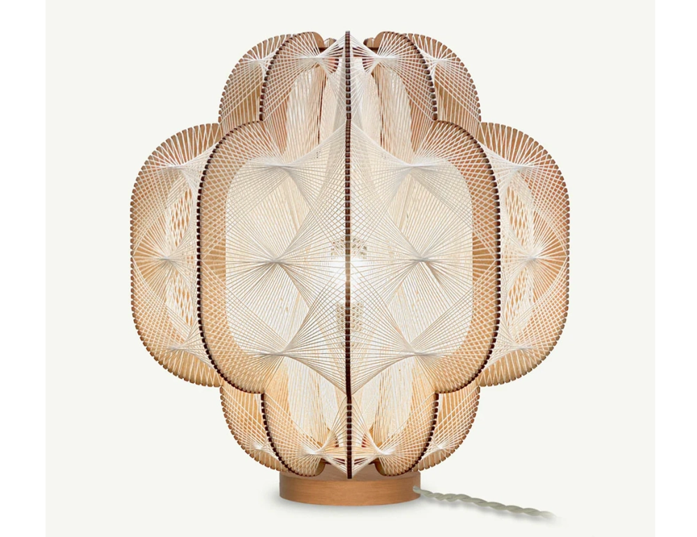 Wooden base lamp with crossed braided cotton wire.