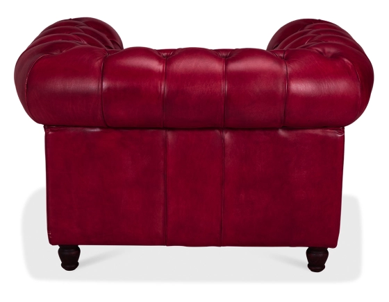 Sillón Chesterfield de piel rojo carmín reposabrazos con tachuelas