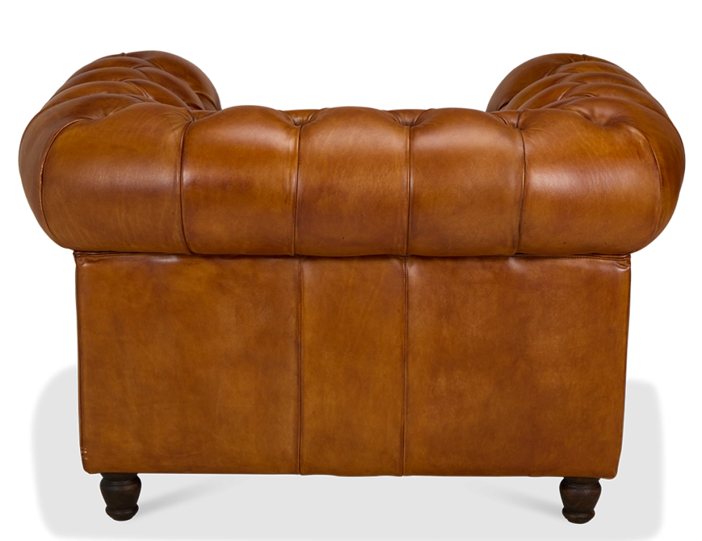 Fauteuil chesterfield cuir marron clair accoudoirs cloutés