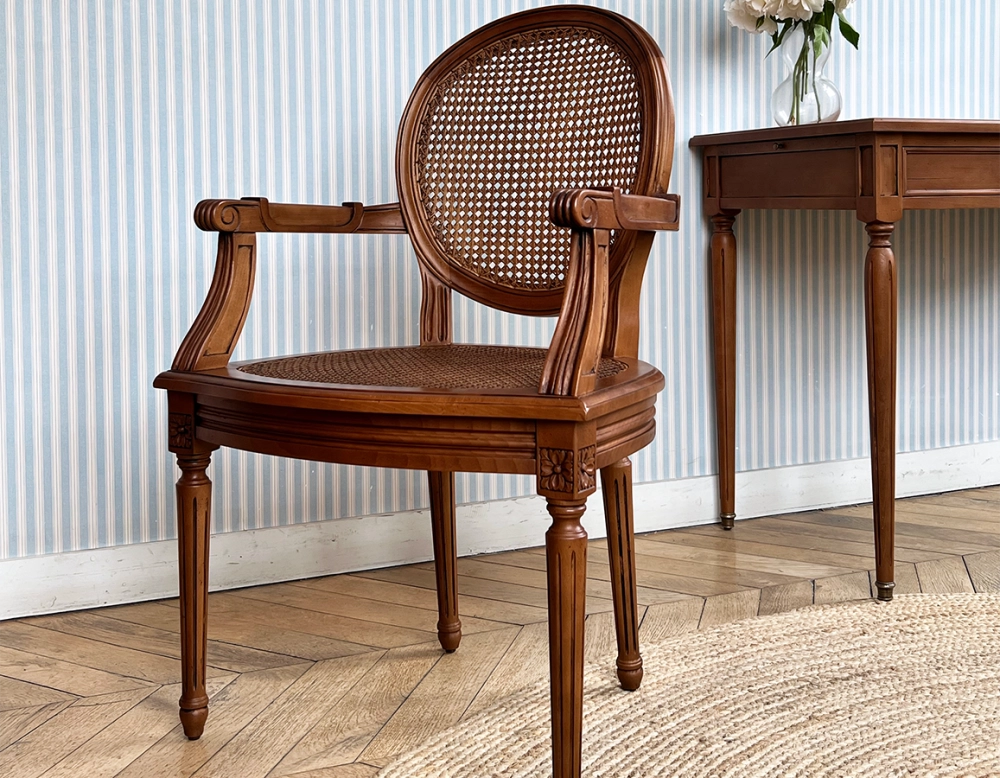 Antique Louis XVI style armchair with armrests wood stained antique seat and back caned