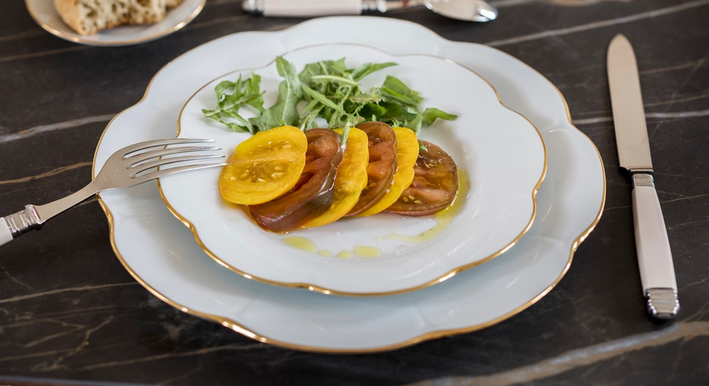 8 person oak and ceramic dining table with natural stained wood and black marble effect ceramic top 210x100 cm