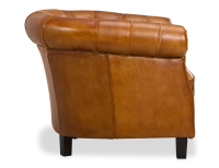 Sillón chesterfield de piel cognac reposabrazos con tachuelas