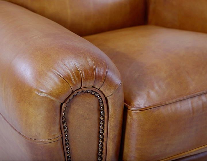 Leather club armchair cognac studded armrests