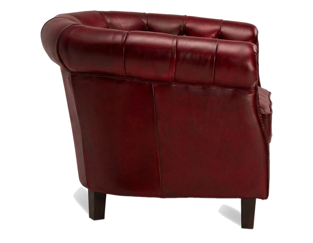 Fauteuil Chesterfield cuir rouge carmin accoudoirs cloutés