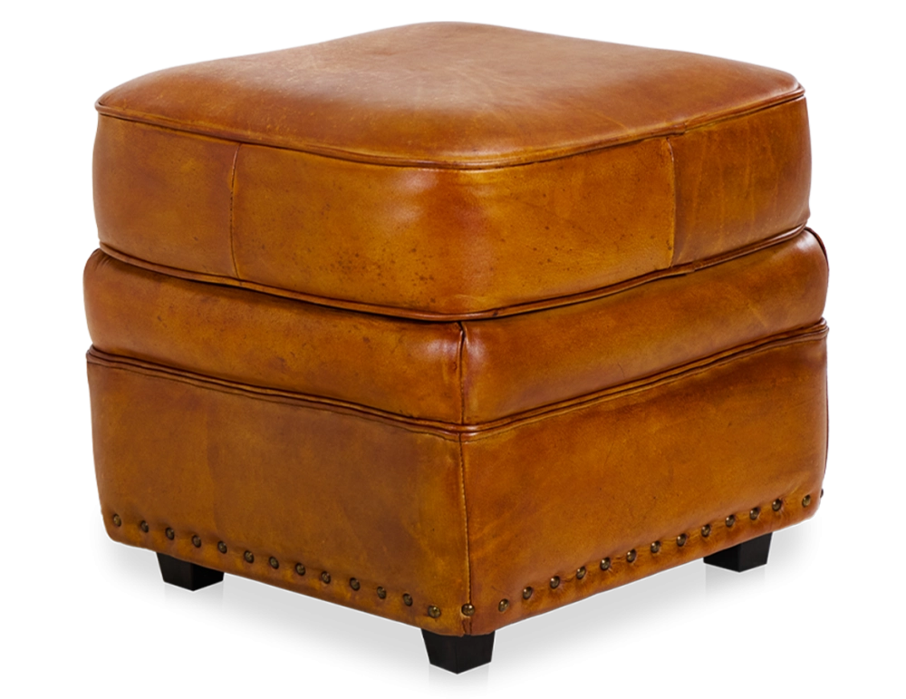 Puf de piel cognac borde tachonado