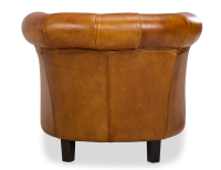 Sillón chesterfield de piel cognac reposabrazos con tachuelas