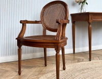 Antique Louis XVI style armchair with armrests wood stained antique seat and back caned