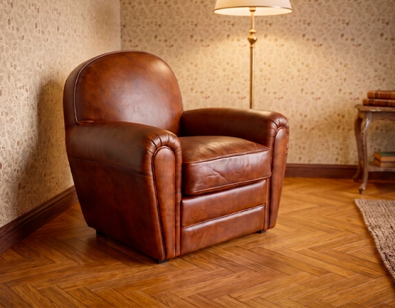 Fauteuil club cuir marron vintage accoudoirs passepoil