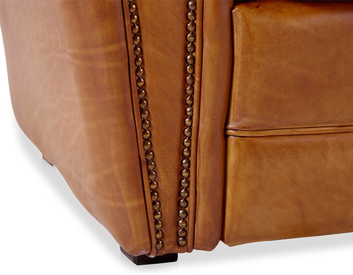 Leather club armchair cognac studded armrests