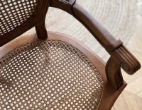 Antique Louis XVI style armchair with armrests wood stained antique seat and back caned