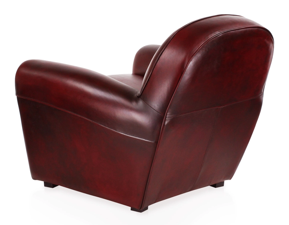Fauteuil club cuir rouge carmin accoudoirs cloutés