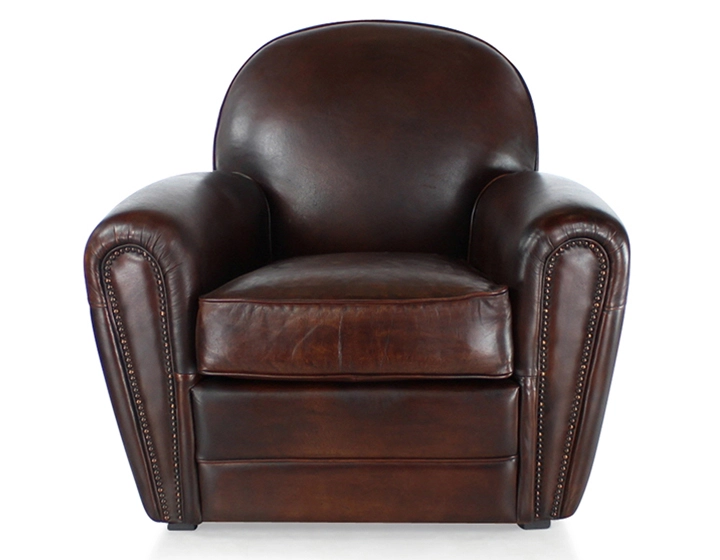 Fauteuil club cuir marron soutenu accoudoirs cloutés