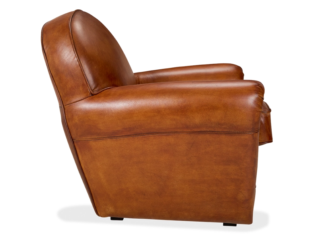 Sillón club de piel marrón claro reposabrazos con tachuelas
