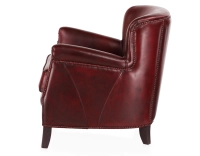 Fauteuil club cuir rouge carmin accoudoirs cloutés