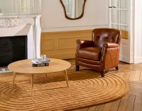 Fauteuil club cuir marron vintage accoudoirs cloutés
