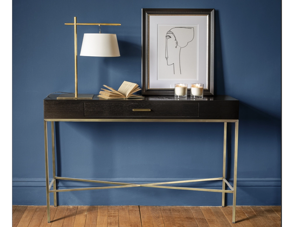 Console design frêne laqué noir et métal patine laiton 100 cm