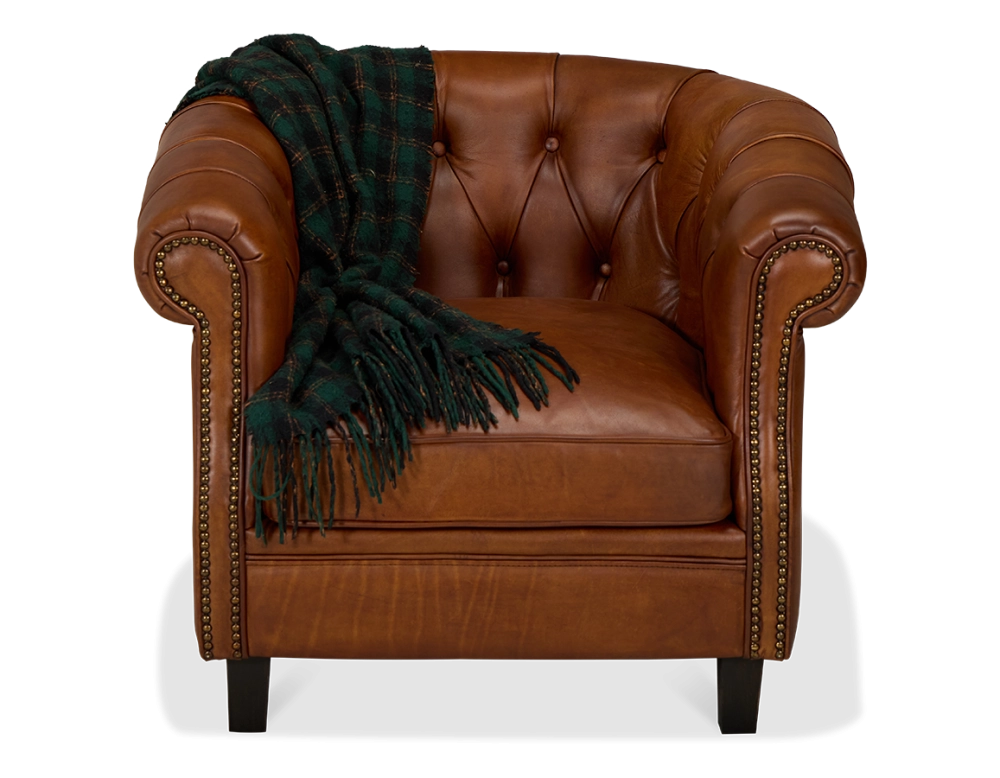 Fauteuil chesterfield cuir marron clair accoudoirs cloutés