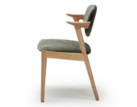 Scandinavian chair wood with a natural finish, velvet fabric seat in forest green.