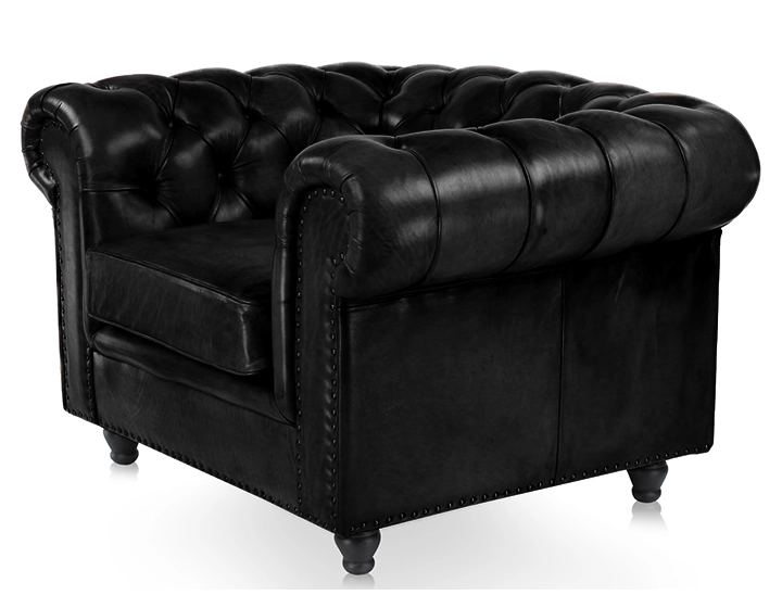 Fauteuil chesterfield cuir noir accoudoirs cloutés
