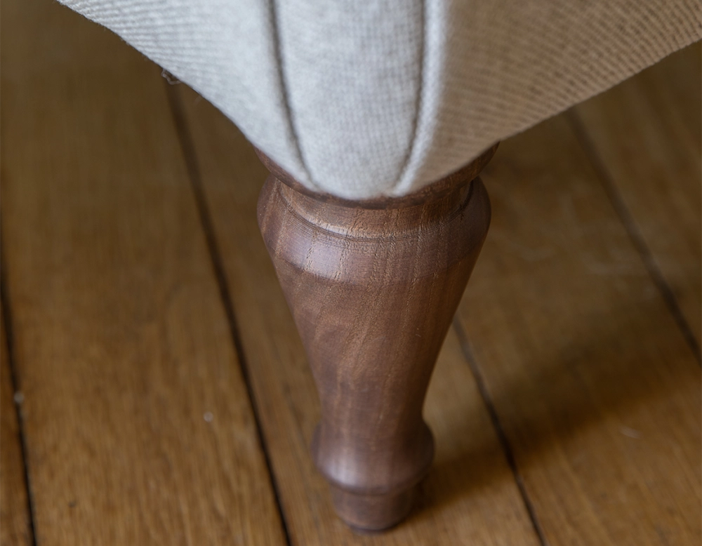 Toad armchair with armrests walnut-stained wooden legs and high-backed natural beige fabric