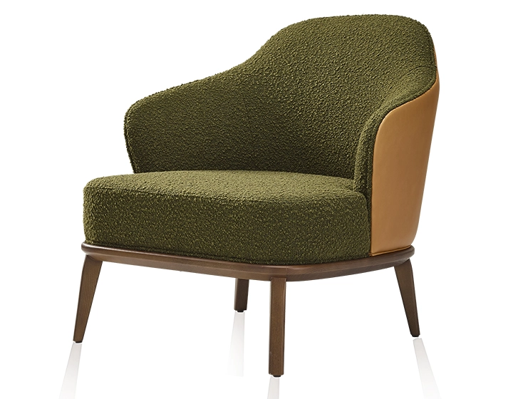 Fauteuil design cuir caramel et tissu bouclé vert