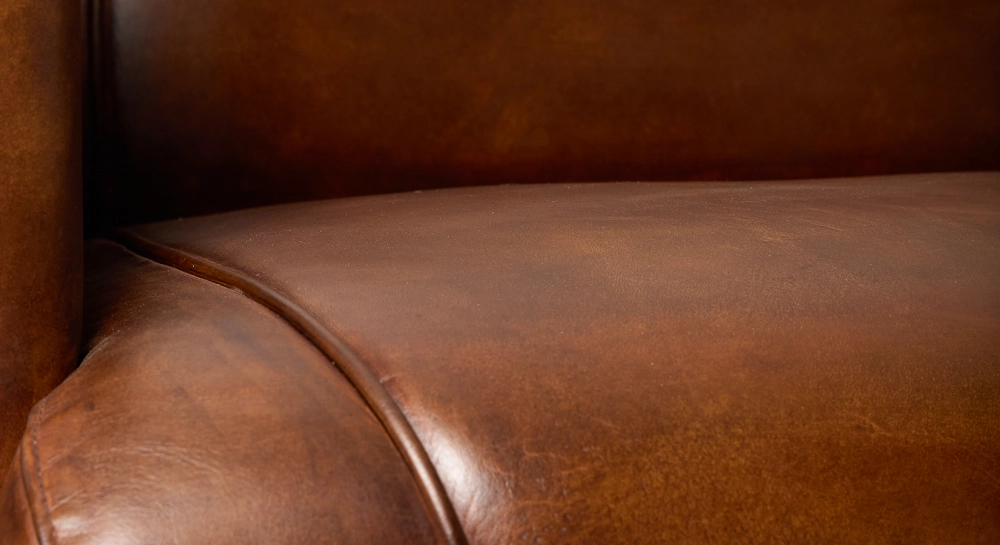 Fauteuil club cuir marron vintage