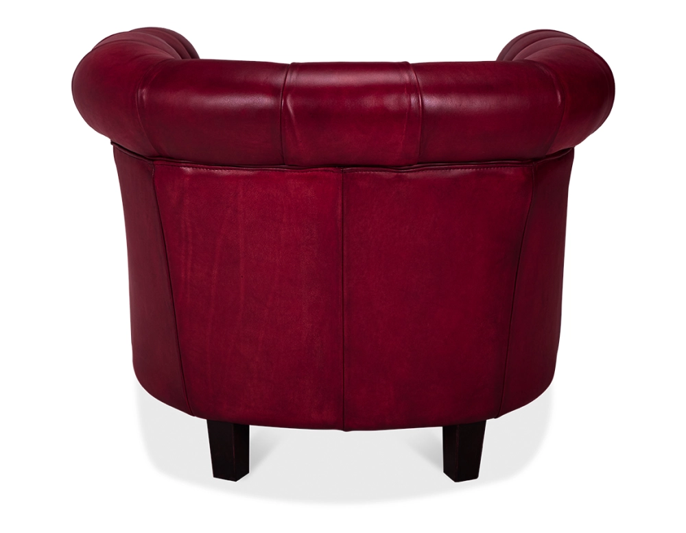 Sillón Chesterfield de piel rojo carmín reposabrazos con tachuelas