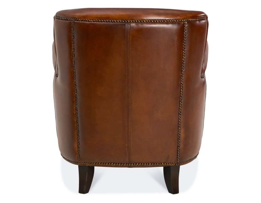 Fauteuil club cuir marron vintage accoudoirs cloutés