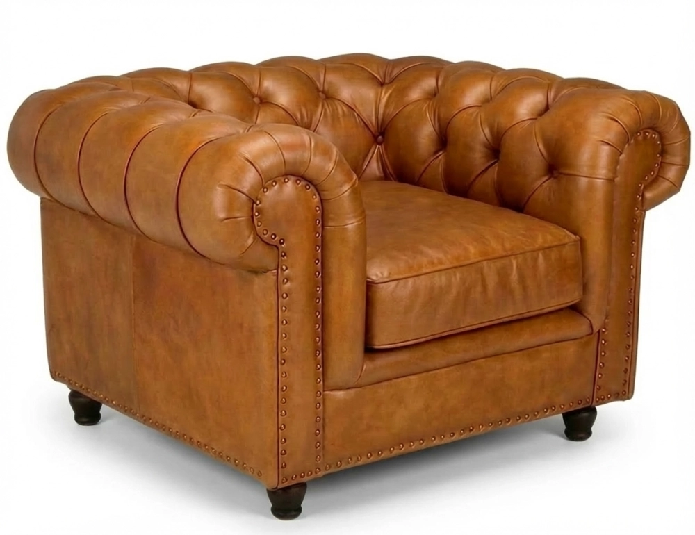 Fauteuil Chesterfield cuir cognac accoudoirs cloutés