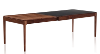 Extending table for 8 to 14 people in walnut and ceramic with wooden extensions with natural stained wood and plain black ceramic top 210x100 cm