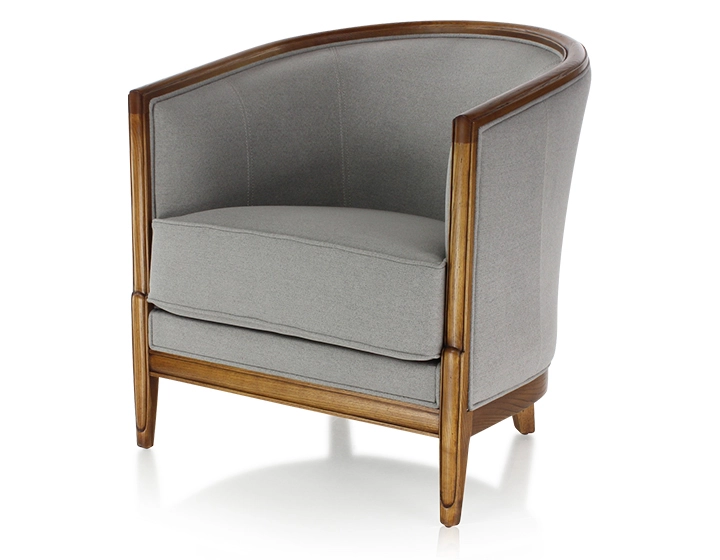 Antique armchair with moulded armrests wood stained in an antique style and light grey fabric