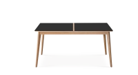 Extendable table for 8 to 14 people in oak and ceramic with wooden extensions with natural stained wood and plain black ceramic top 210x100 cm