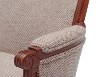 Fauteuil bergère mouluré style Louis XVI bois teinte ancienne et tissu chiné beige, gris et orange