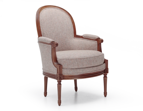 Fauteuil bergère mouluré style Louis XVI bois teinte ancienne et tissu chiné beige, gris et orange
