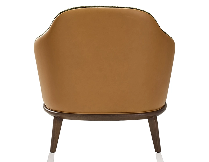 Fauteuil design cuir caramel et tissu bouclé vert