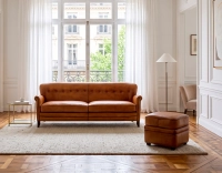 Pouf cuir marron clair bord clouté