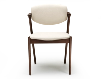 Chaise scandinave bois teinte marron foncé assise tissu blanc cassé