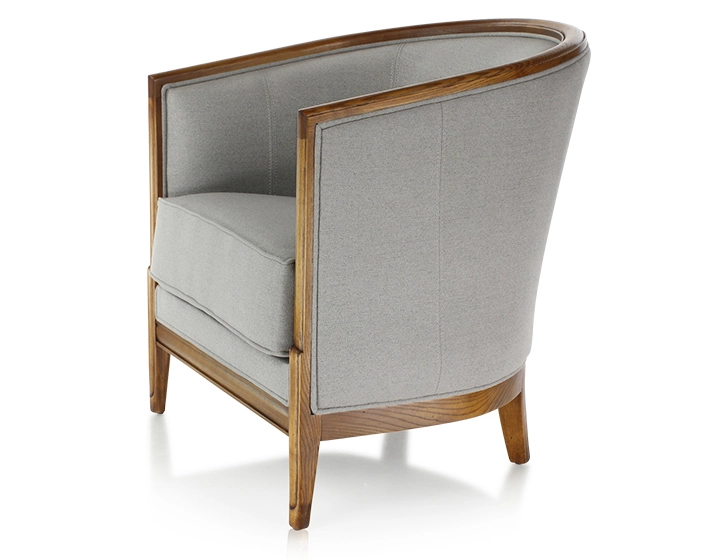 Antique armchair with moulded armrests wood stained in an antique style and light grey fabric